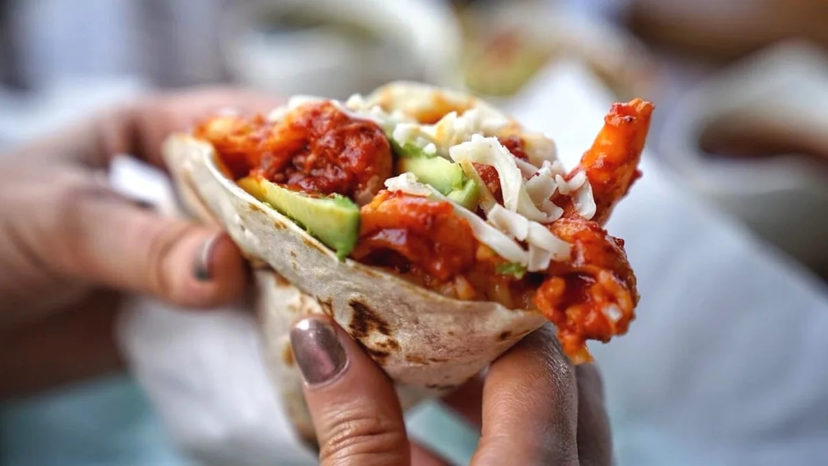 green kush in clear plastic container