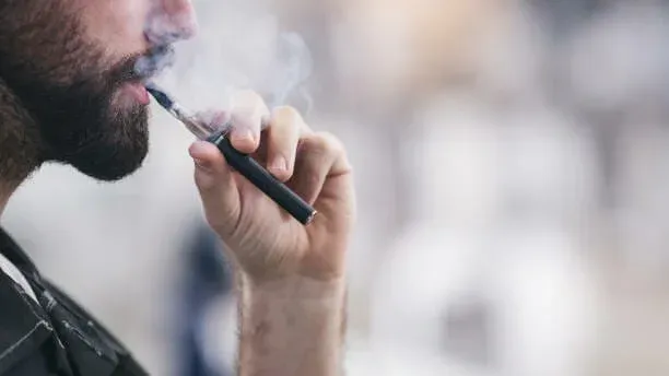 man vaping